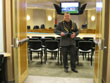 Warden Jim Smith cutting the ribbon...