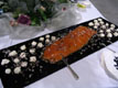 smoked salmon on black glass